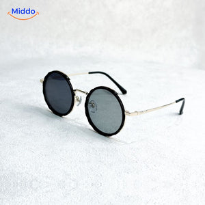 Round sunglasses with elegant golden frame and UV protection coating.