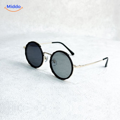 Round sunglasses with elegant golden frame and UV protection coating.