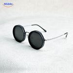Black round sunglasses with metal frame and UV protection lens technology.