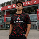 World Cup supporter shirt in Canada colors: black and red national flag design.