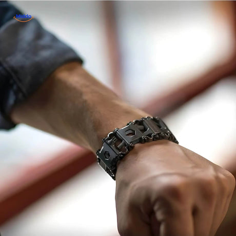 Stainless steel multi-tool bracelet styled on wrist for everyday wear and function.