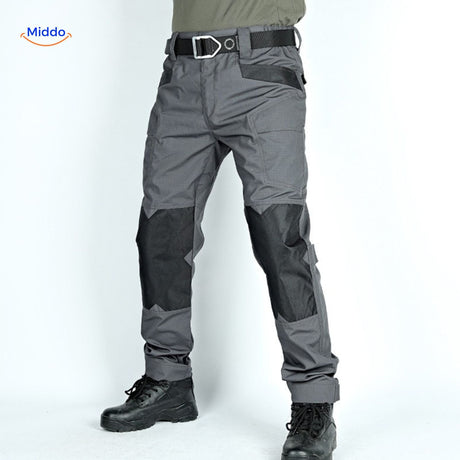 Grey tactical pants showing side profile and pocket placement.