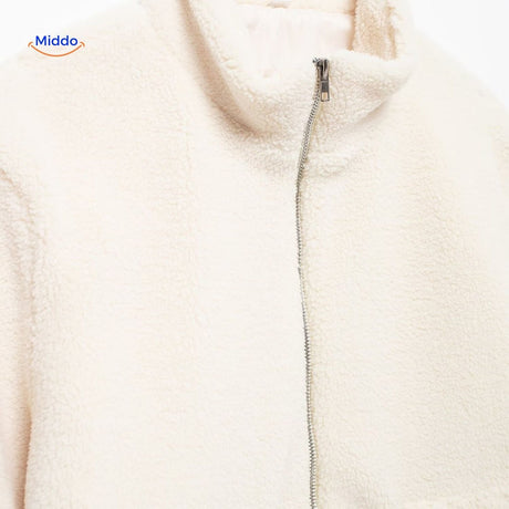 White teddy wool coat front zipper view with high collar design prominent.