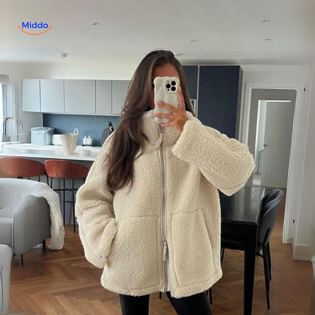 White teddy wool coat front view with high collar detail clearly visible.