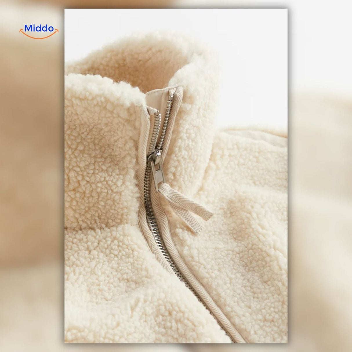 White teddy wool coat zipper closeup highlighting premium hardware and craftsmanship.