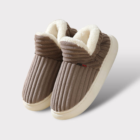 Brown therapeutic fleece winter slippers with white cushioned lining and non-slip sole.