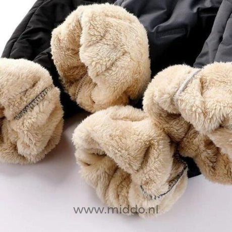 Soft fleece lining interior of waterproof thermo pants for warmth.