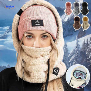 Thermal balaclava worn in snowy conditions with fleece-lined hood and face mask protection.