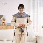 Thermowrap portable heated wrap with adjustable strap for secure and flexible wearing.