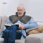Thermowrap heated wrap provides comfort for seniors during reading and relaxation time.