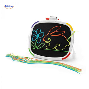 Child building creative designs with ThreadArt Builder string puzzle toy.