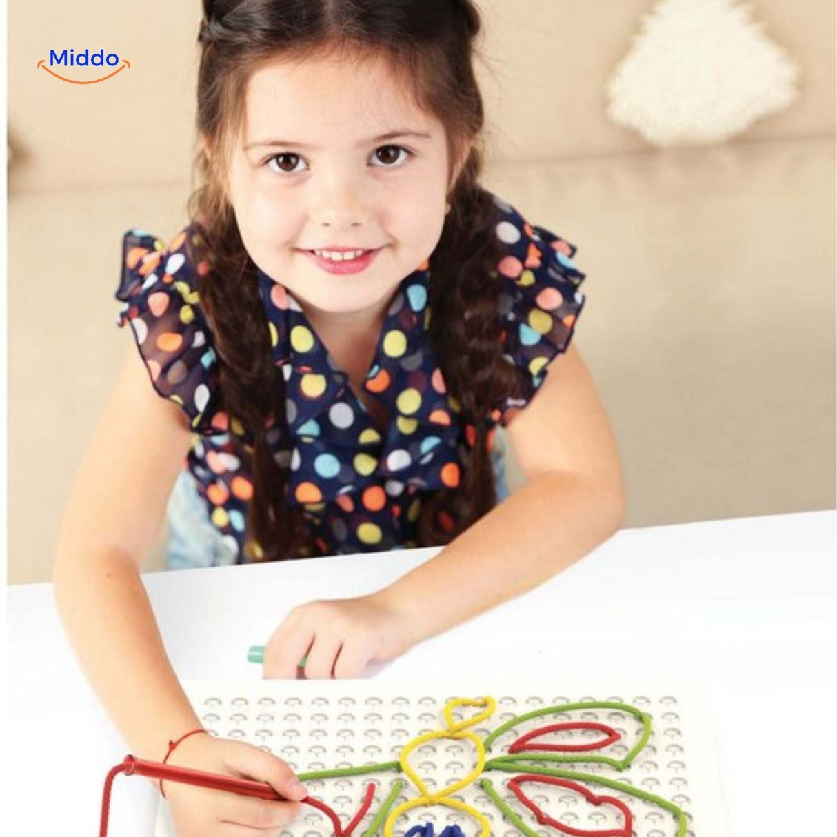 ThreadArt Builder creative string puzzle displayed with colorful wooden base and threads.