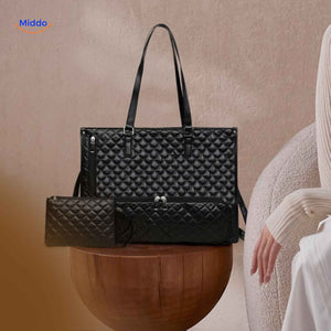 Black quilted Totezia cooler handbag with elegant and sophisticated design.