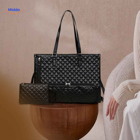 Black quilted Totezia cooler handbag with elegant and sophisticated design.