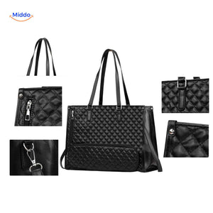 Close-up detail of black quilted Totezia handbag with coordinating accessories.
