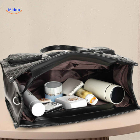 Black Totezia handbag showing spacious interior with multiple storage compartments.