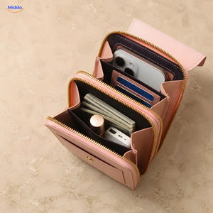 Open pink TouchScreenGo bag with compartments for a phone cards and cash