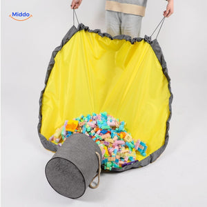 Toy storage bag partially filled with colorful building blocks.