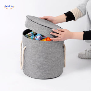 Toy storage bag in yellow with cheerful smiley face design.