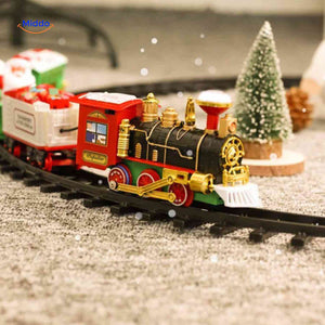 ChristmasRail on track with festive miniature Christmas decorations and scenery.