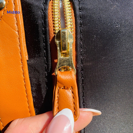 Premium durable zipper on luxe travel garment duffel bag.