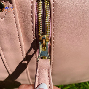 Smooth zipper action on water-resistant carry-on duffel.