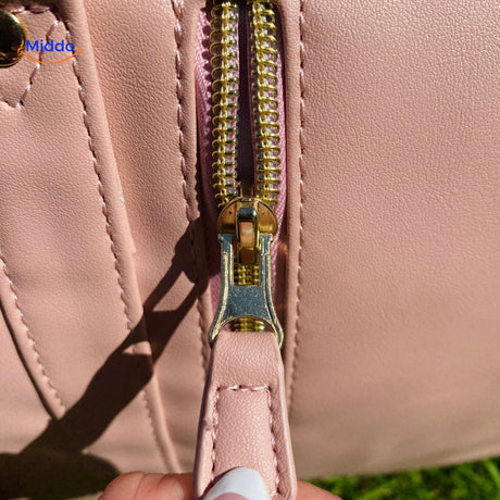 Smooth zipper action on water-resistant carry-on duffel.