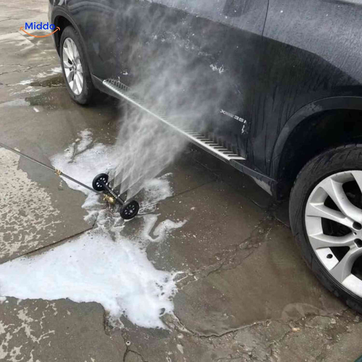 HydroClean 4000 PSI cleaner spraying ground-level underneath vehicle.