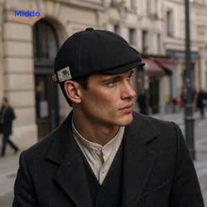 Urban Heritage Flat Cap in Black worn on a city street