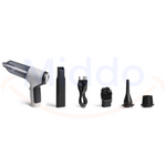 VacuumX PRO handheld vacuum with included brush attachments and accessories.