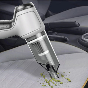 VacuumX PRO cordless vacuum being used to clean car interior and seats.