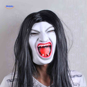 Vampire mask with wide-open mouth and sharp teeth for fierce appearance.
