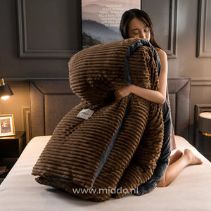 Warm brown velvet fleece duvet provides luxurious comfort and style.