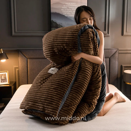 Warm brown velvet fleece duvet provides luxurious comfort and style.