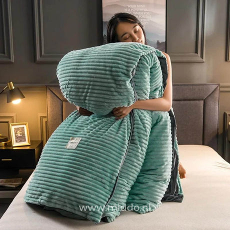 Elegant jade green velvet fleece duvet adds color and warmth to bedrooms.