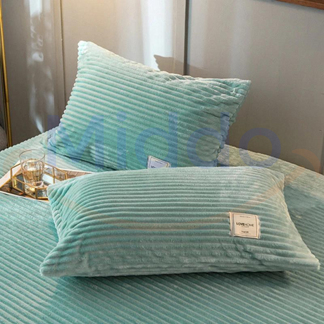 Jade green velvet fleece pillowcase with ultra-soft warmth and calming natural tone.