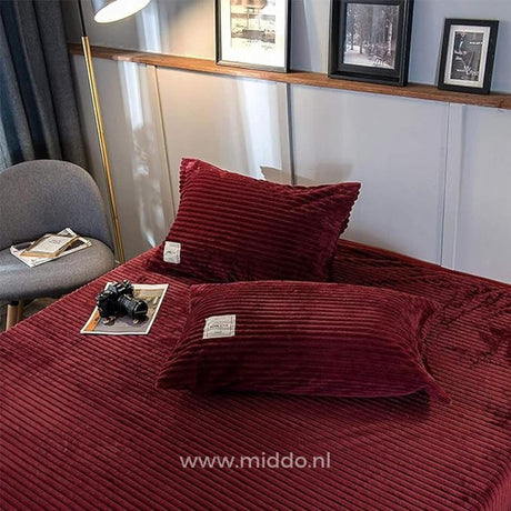 Bordeaux velvet fleece pillowcases pair with matching duvet collection.