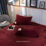 Bordeaux velvet fleece pillowcases pair with matching duvet collection.