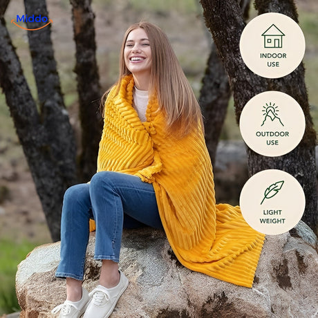 Versatile fleece blanket perfect for outdoor relaxation and picnics.