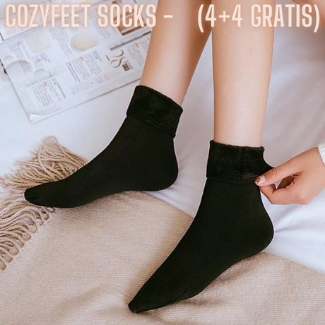 Black velvet socks showing plush fabric and comfortable fit.