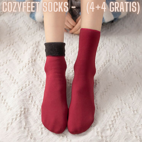 Red velvet socks worn showing soft seasonal style.
