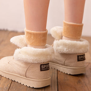 Velvet socks paired with matching cozy slippers for warmth.