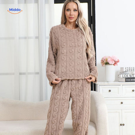 Pink soft fleece pajama set ideal for cozy cold nights and relaxation.