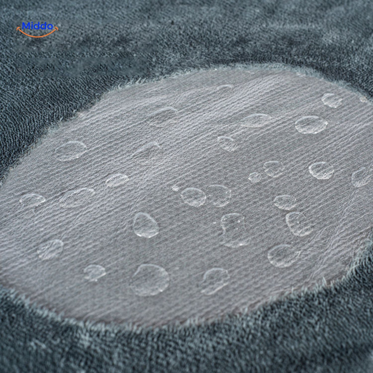 Waterproof pet blanket with cozy fleece lining for full moisture protection.