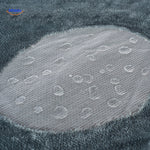 Waterproof pet blanket with cozy fleece lining for full moisture protection.