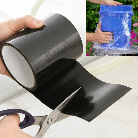 Waterproof repair tape being cut with scissors for easy application.