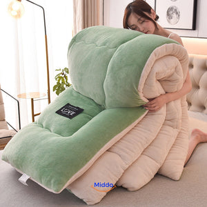 ComfortLux green wool-velvet weighted blanket offering soothing color and therapeutic weight.