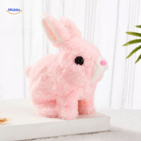 White plush bunny with a pink nose detail in soft lighting, highlighting its realistic and lifelike look.