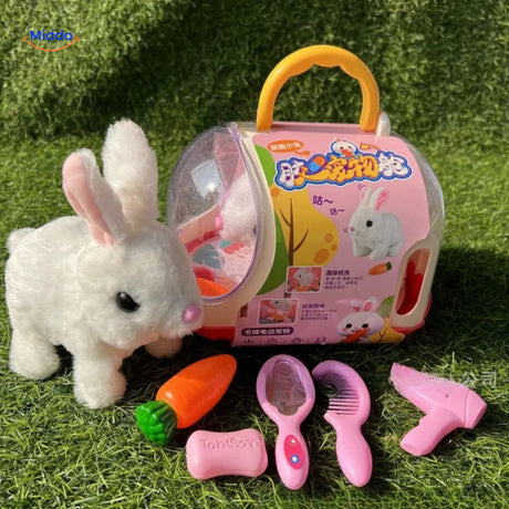 White plush bunny toy displayed with accessories in its box, showing everything included in the set.