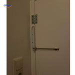 White door closer showing installation steps for simple door setup.